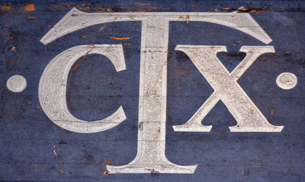 Perfect for trendy loft or office installation, this framed wooden sign in muted navy blue and silver lettering is from the tractor plow company Rock Island Plows in Illinois, circa 1890s. CTX was one of their best selling models and the slogan was