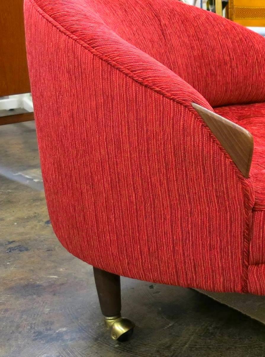 Adrian Pearsall funky Mid-Century Modern round tufted lounge chair and matching ottoman, circa 1960s, reupholstered in red woven fabric. Generously proportioned, the chair and ottoman could be used as a chaise longue. Both chair and ottoman have