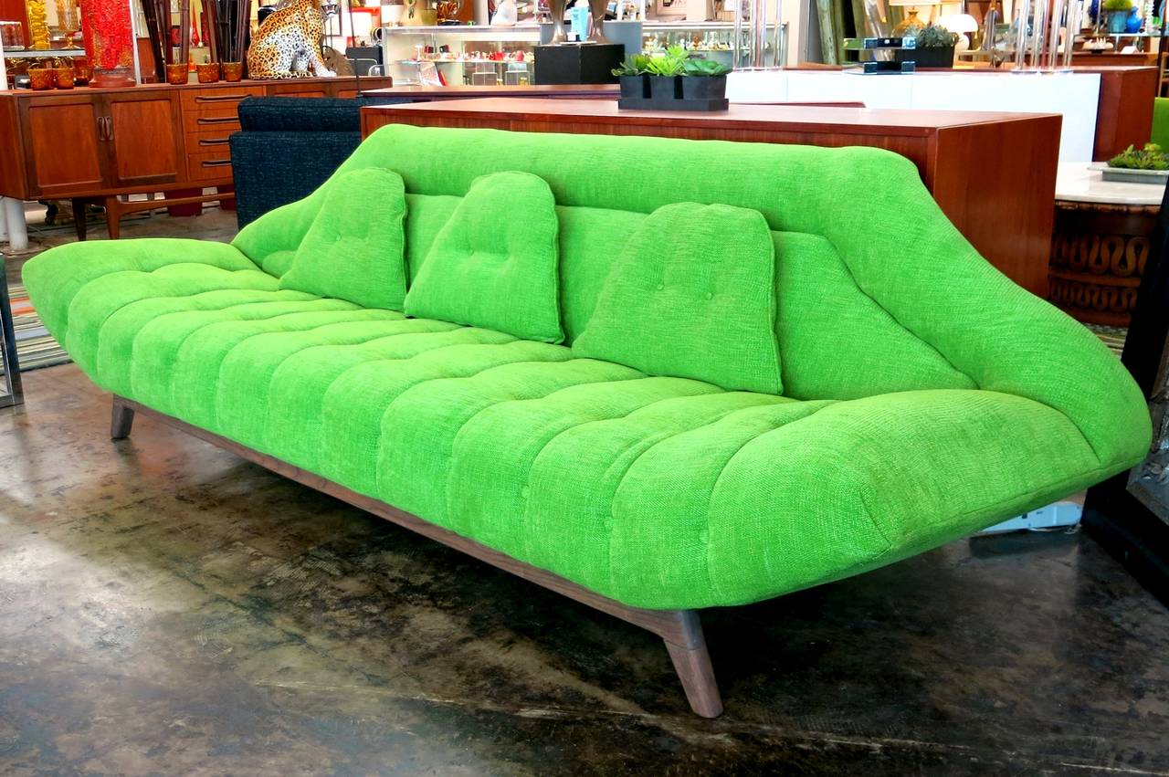 This very sculptural Adrian Pearsall Mid-Century Modern gondola sofa from the 1960s has been reupholstered in beautiful grass green woven fabric and the walnut frame has been refinished. The tufting on the sofa adds detail to the swooping seat and