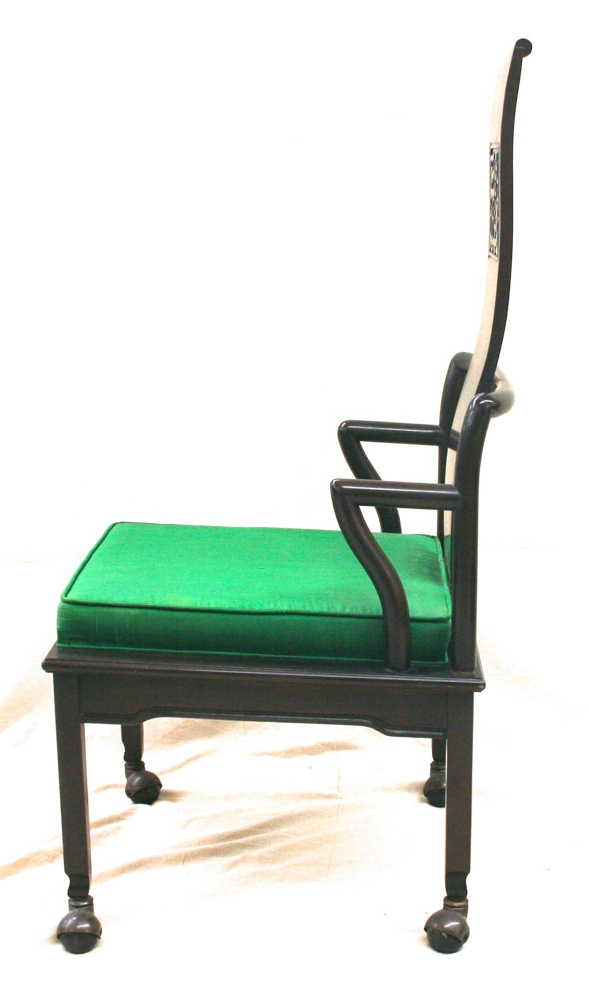 Set of six dining chairs by John Widdicomb in Mid-Century Modern Chinese inspired style. Black lacquered wood frames with green silk cushions. Two high back chairs, four low cushion back chairs. All chairs have original casters on feet.