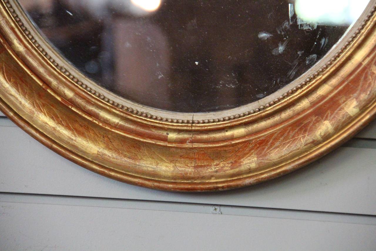 Louis Philippe Pair of Oval Gilt Mirrors For Sale