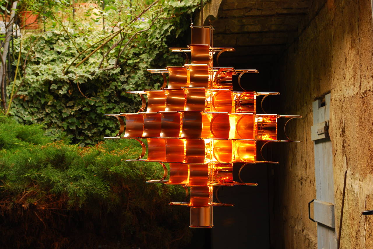 This beautiful lighting creation of Sauze exist also in 95 cm, it is also available.
It exists in various colors (Silver, cop, gold, salmon).
Materials: Copper, Gold Color
Max Sauze is one of the most important French designer of the 20th century.

