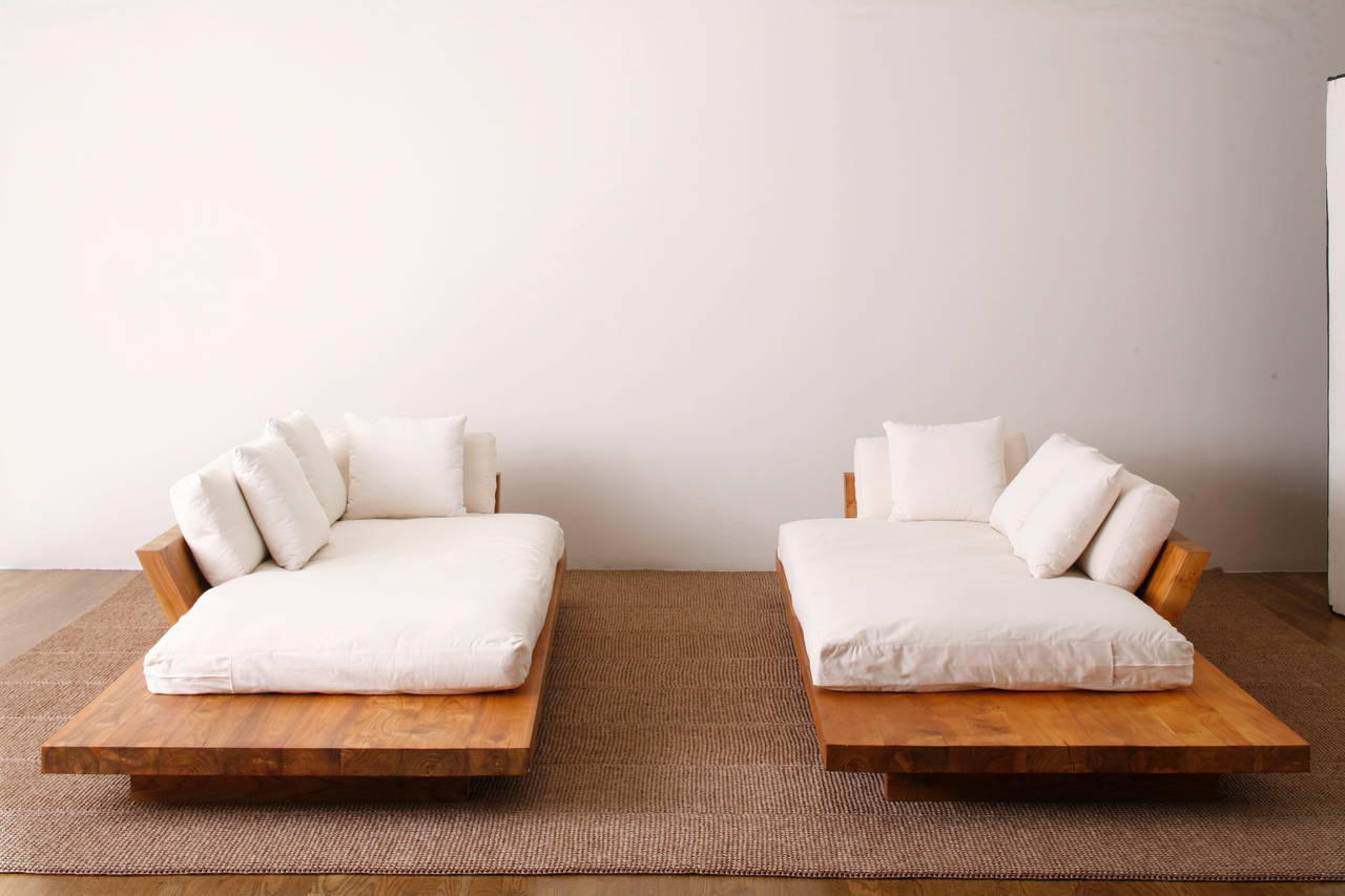 Solid teak single arm sofa custom made in Bali. Standard cushions: foam inserts with cotton covers made in the US. Optional COM. Collaborative design by Donna Karan and Bonetti/Kozerski Studio. Limited quantity currently in stock. No international