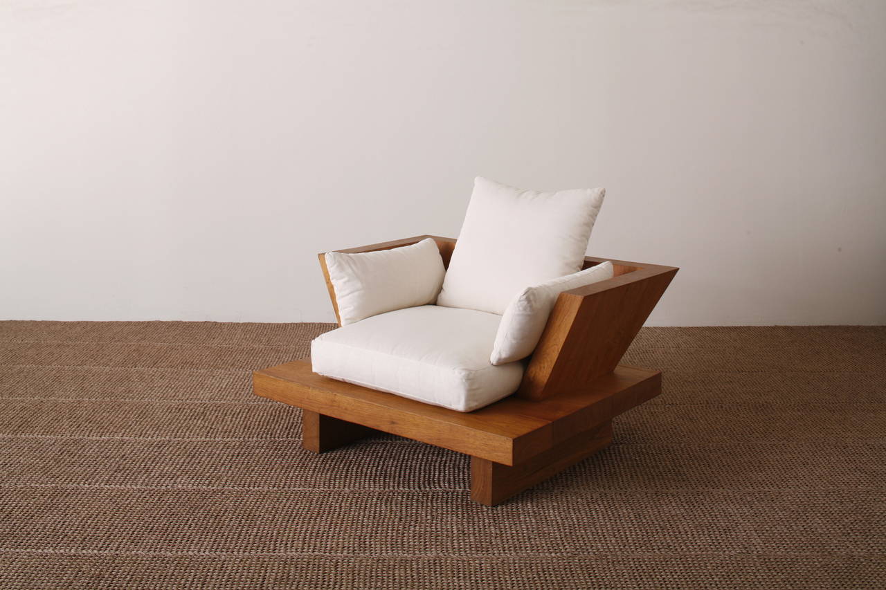 Solid teak single armchair custom made in Bali. Standard cushions: foam inserts with cotton covers made in the US. Optional COM. Collaborative design by Donna Karan and Bonetti Kozerski studio. Limited quantity currently in stock. No international