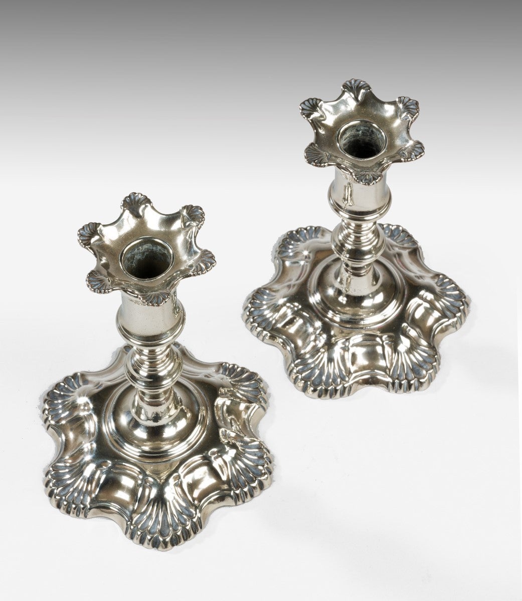 Probably Canton.

Unusually, with proportionately tall nozzles, original bobeches; and on short screw stems and shell bases. Original foundry patched on reverse.

Bibliography: See Keith Pinn, 'Paktong: The Chinese Alloy in Europe, 1680-1820'