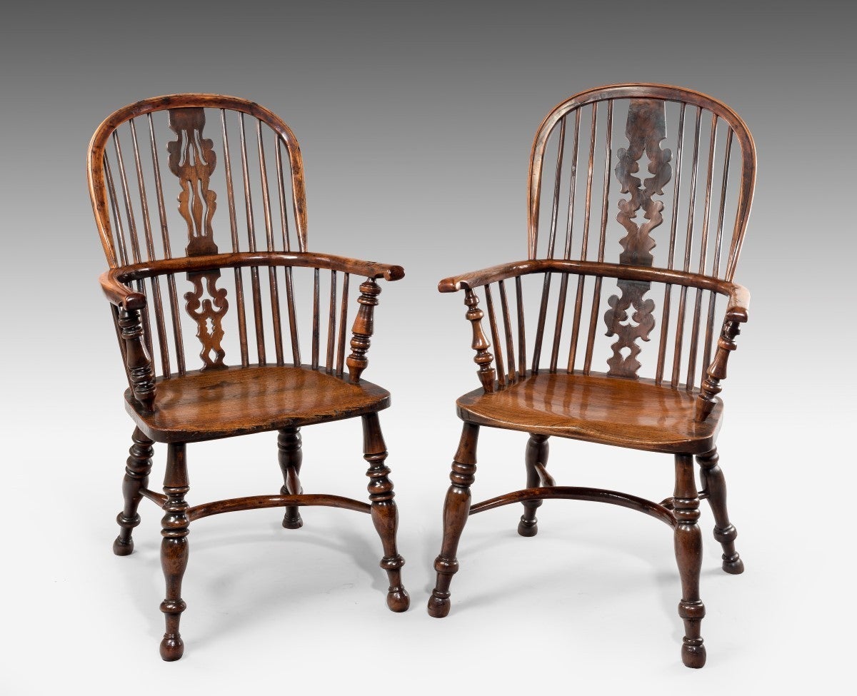 England, probably Nottinghamshire.

A set of four low-back Windsor elbow chairs and two high-back Windsor elbow chairs. Each chair with a highly decorated central splat and four cabriole legs which are joined by a turned and curved ‘H’ stretcher.