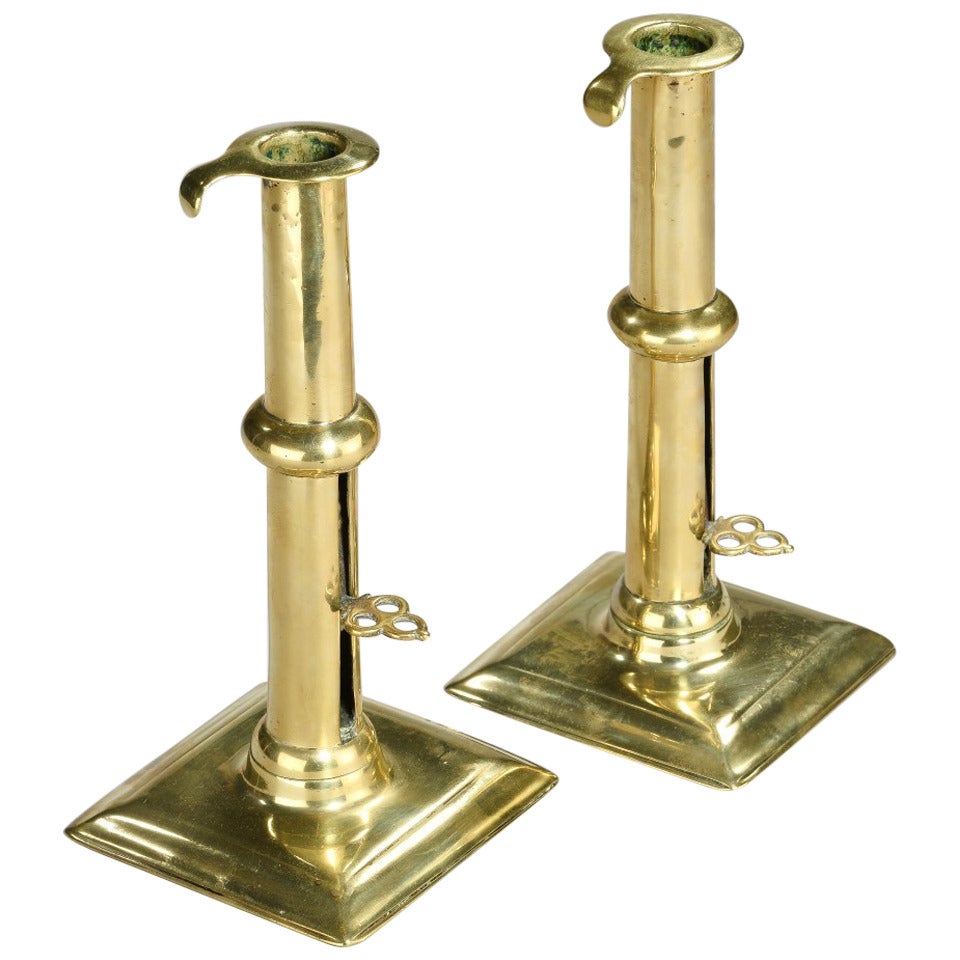 Pair of Square Base Brass Candlesticks with Slide Ejectors