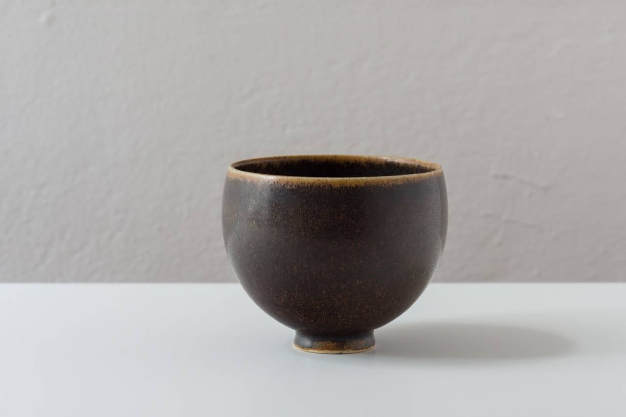 A unique stoneware bowl with a deep, brown haresfur glaze.  Stamped with the Yin/Yang Saxbo seal, Saxbo, Denmark.