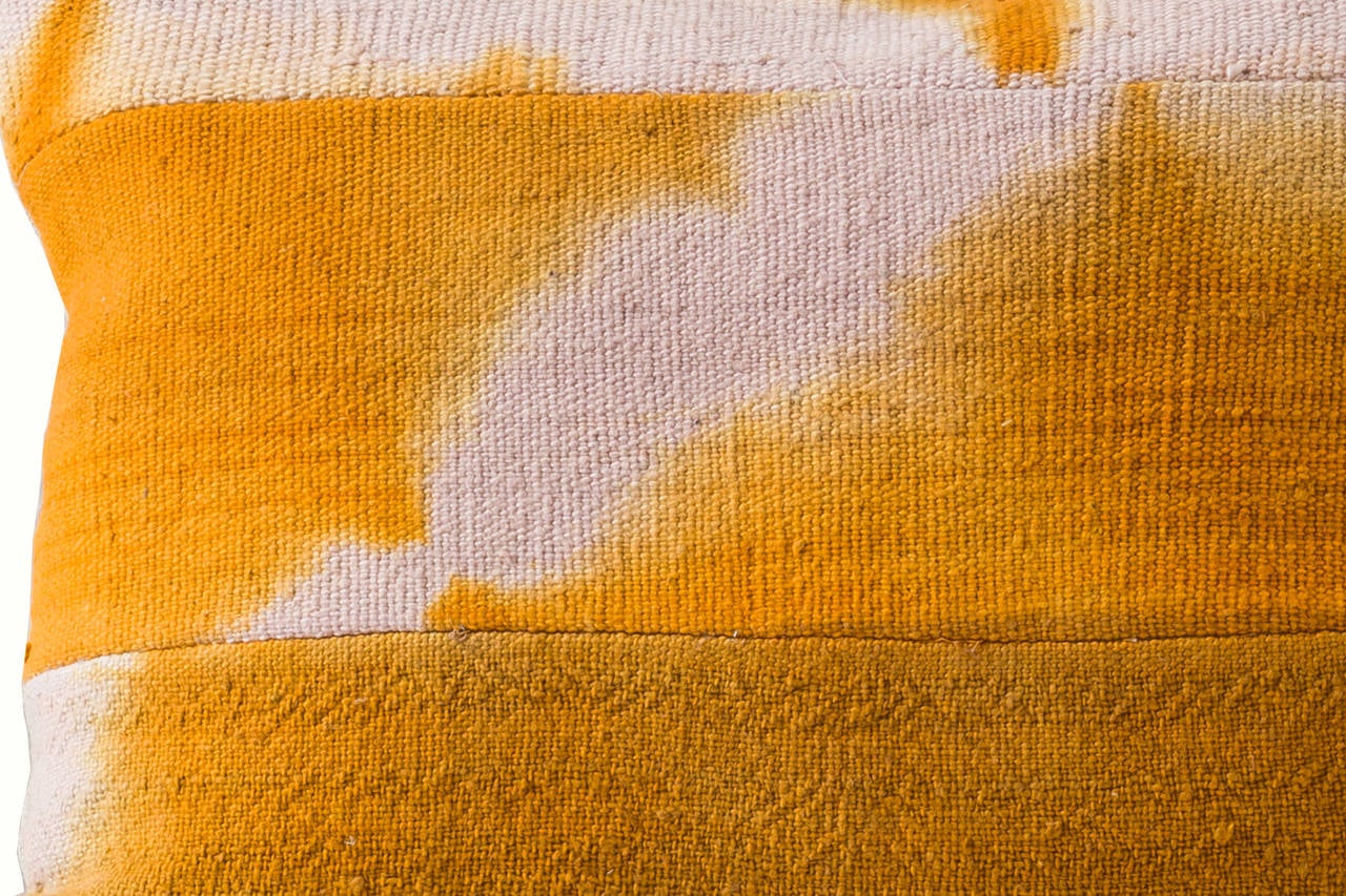 Vintage muted over-dyed orange resist Mudcloth- Mali, West Africa. Narrow hand loomed cotton strips. 

- Linen on reverse--see image
- 75/25 goose feather and down inserts.
- Concealed zippers.
- Check our 1stdibs storefront for pillows in