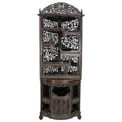 19th Centuy Chinese hardwood corner cabinet.