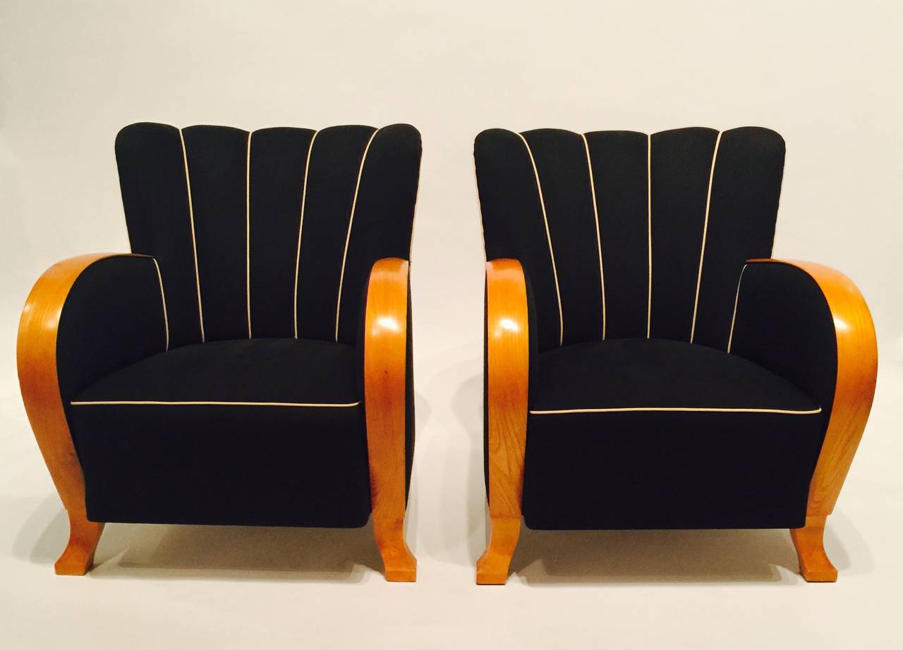 A Pair Of Black Scalloped Art Deco Chairs With A Contrasting Beige Welt On Maple Feet