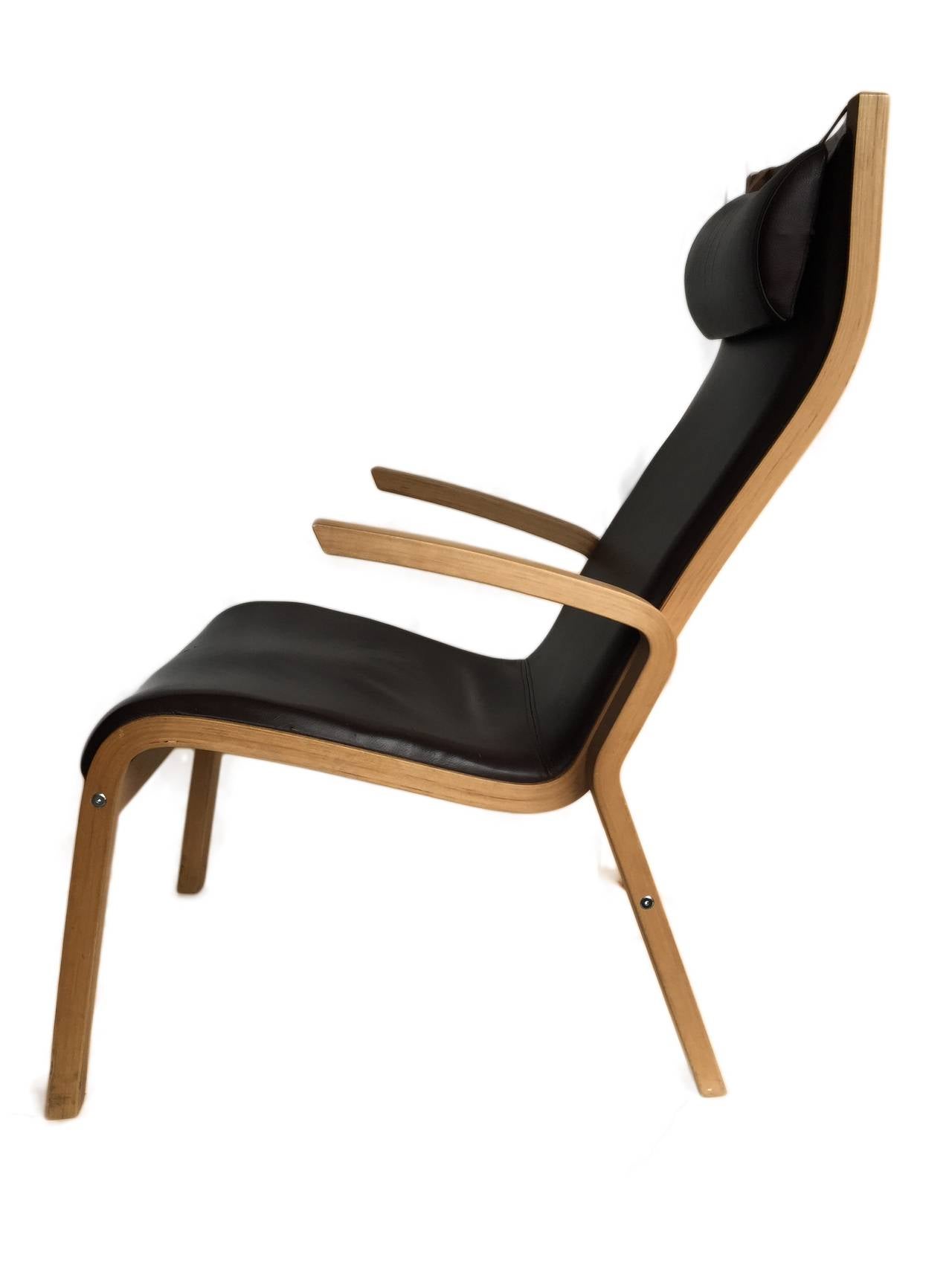 Danish bentwood armchair by Jakob Berg.
1960's Oak and Deep brown Leather.