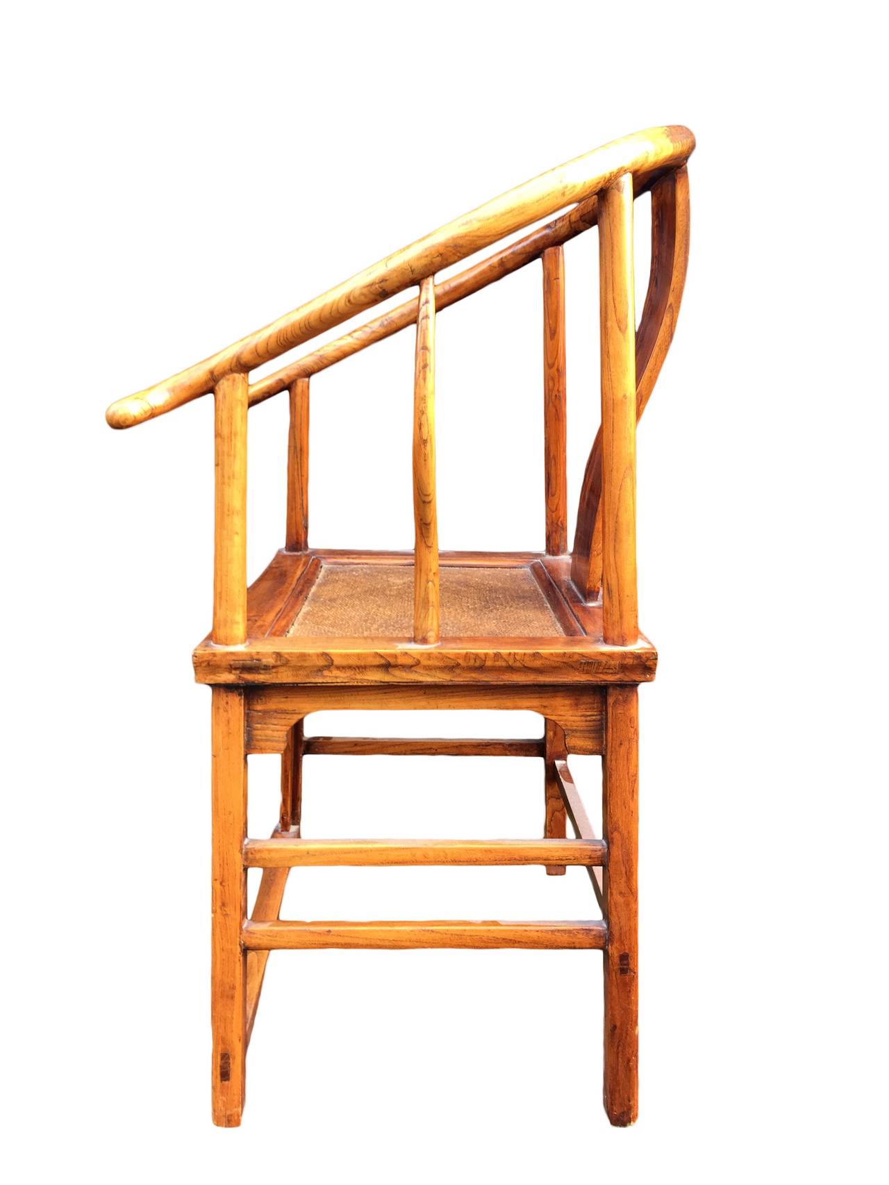Early 20thC Chinese jointed Horseshoe chair.
Sweeping gooseneck arms. Original inset cane seat.
