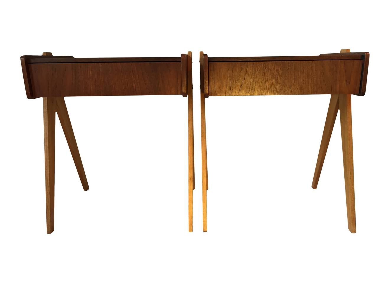 A totally unique pair of nightstands constructed in oak and teak with drawers. 
Made in Denmark, circa 1960.