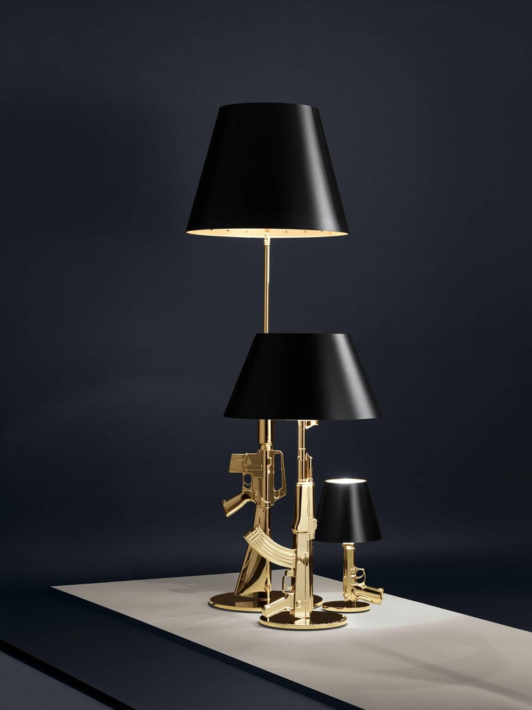 Flos Guns Collection Ak47 Table Lamp In Gold By Philippe Starck For This Provocative Table Lamp Is Part Of The Artist S Guns Collection Making A Statement While