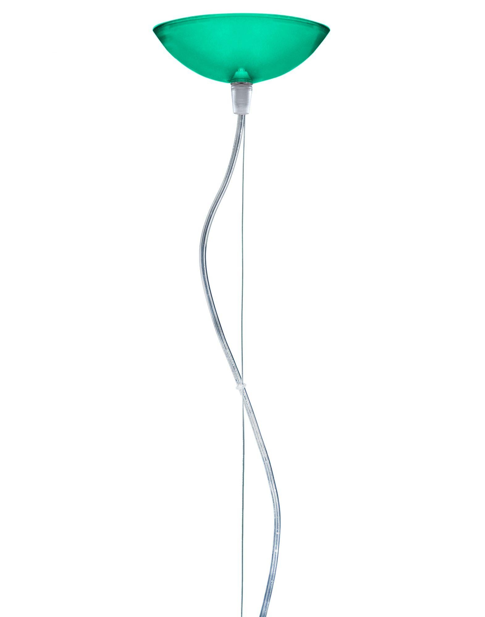 An essential lamp which is characterised by the “subtle interpretations of the theme. Made in transparent methacrylate in emerald green, the cover is not perfectly hemispherical but the cut-off is underneath the height of the diameter to collect the