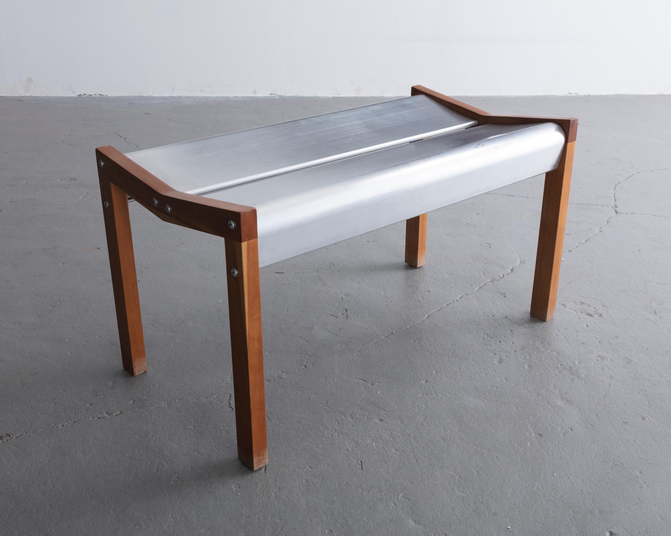 Rasamny bench v. 2 prototype in anodized extruded aluminum and wood. Designed by Ali Tayar, 1999.