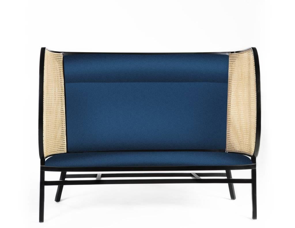 The hideout loveseat two-seater sofa is a result of the creative minds of the Swedish duo Front. The sofa recalls the lounge chair with the same name that is one of the icons of the brand and shares the same technical and aesthetic features. An