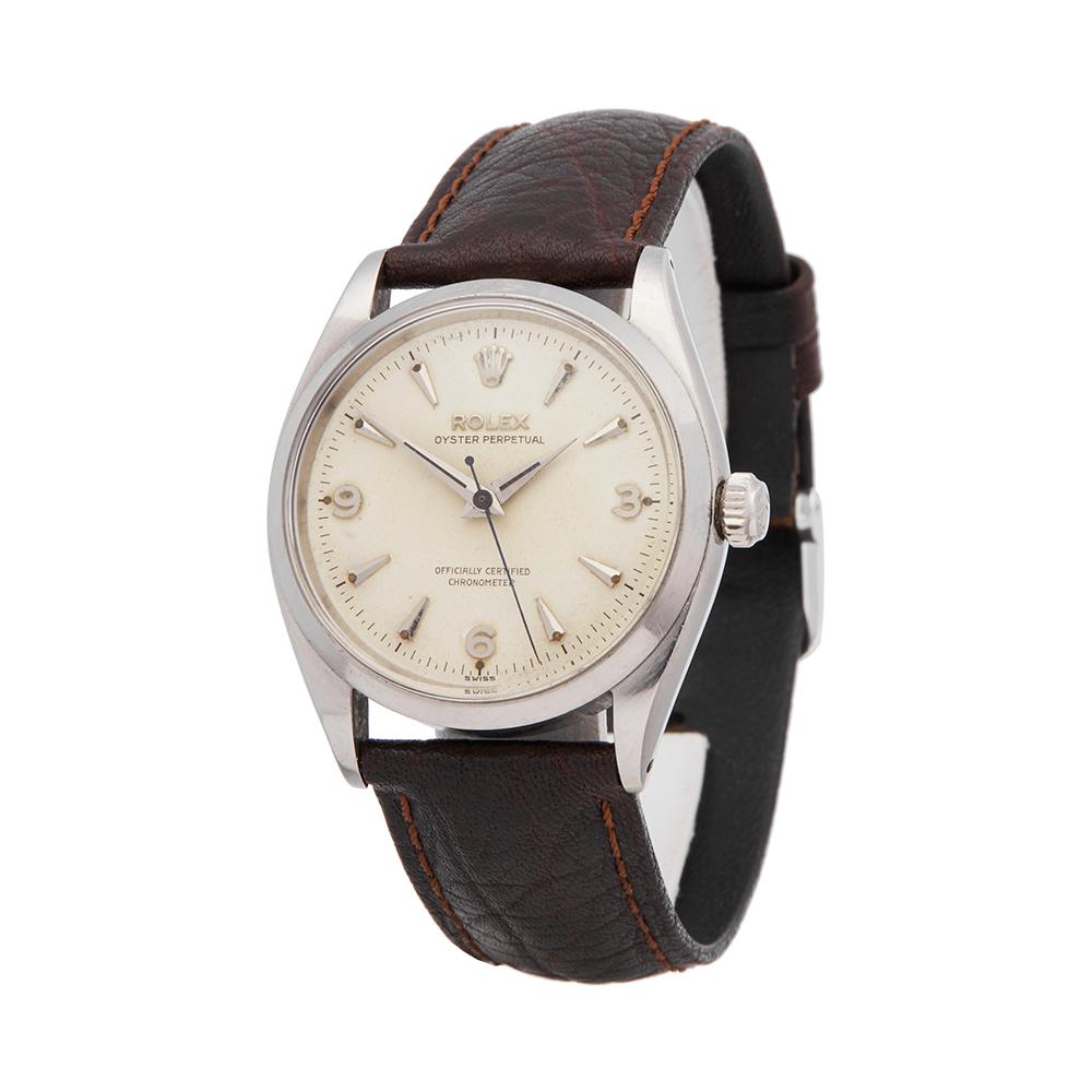 Vintage
 *
 *Complete with: Box, Manuals & Guarantee dated 29th April 1957
 *Case Size: 34mm
 *Strap: Brown Calf Leather
 *Age: 1957
 *Strap length: Adjustable up to 20cm. Please note we can order spare links and alternate length/colour straps if