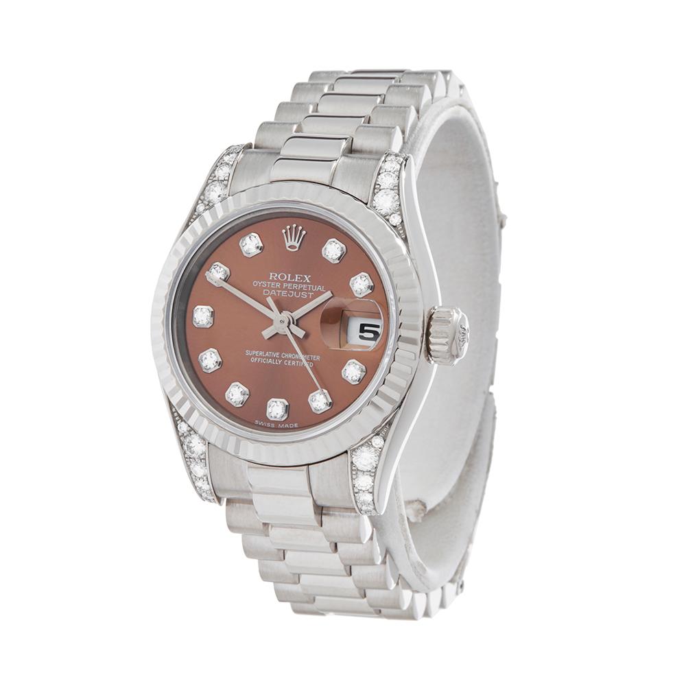 Contemporary 2001 Rolex Datejust 26 White Gold 179239 Wristwatch
 *
 *Complete with: Box Only dated 2001
 *Case Size: 26mm
 *Strap: 18K White Gold President
 *Age: 2001
 *Strap length: Adjustable up to 17cm. Please note we can order spare links and