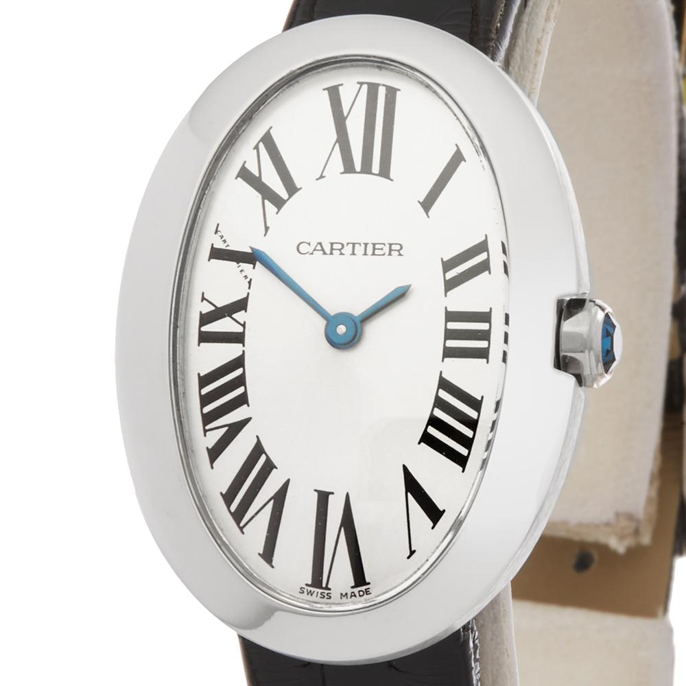 Contemporary 2010's Cartier Baignoire White Gold W8000001 Wristwatch
 *
 *Complete with: Box & Service Papers 17th April 2018 dated 2010's
 *Case Size: 23mm by 32mm
 *Strap: Black Leather
 *Age: 2010's
 *Strap length: Adjustable up to 20cm. Please