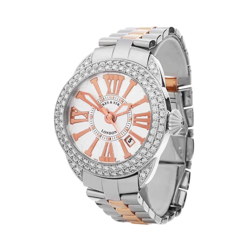 Contemporary 2018 Backes & Strauss Piccadilly Diamond Stainless Steel Wristwatch
 *
 *Complete with: Box, Manuals & Guarantee dated 2018
 *Case Size: 40mm
 *Strap: Stainless Steel & 18K Rose Gold
 *Age: 2018
 *Strap length: Adjustable up to 20cm.