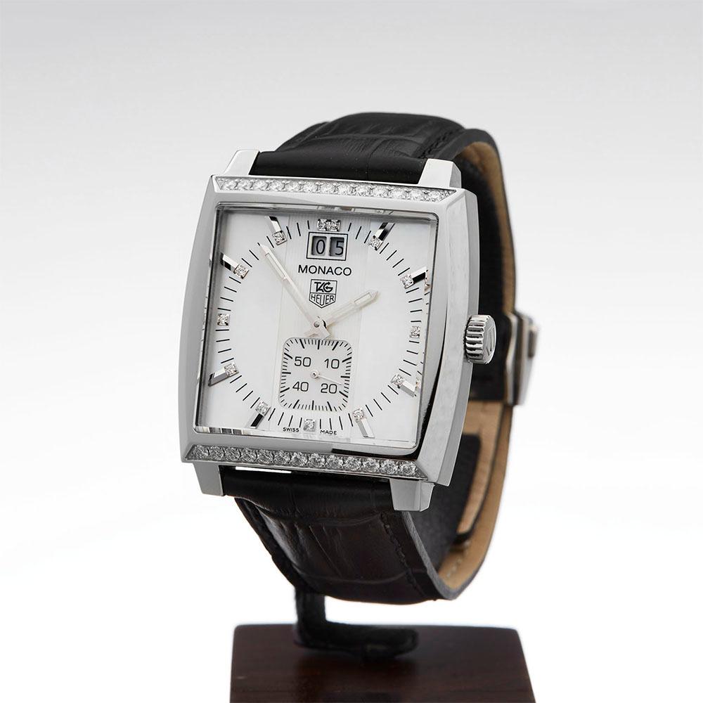 Contemporary 2010 Tag Heuer Monaco Stainless Steel WAW1313 Wristwatch
 *
 *Complete with: Box, Manuals & Guarantee dated 3rd September 2010
 *Case Size: 37mm
 *Strap: Black Leather
 *Age: 2010
 *Strap length: Adjustable up to 18cm. Please note we