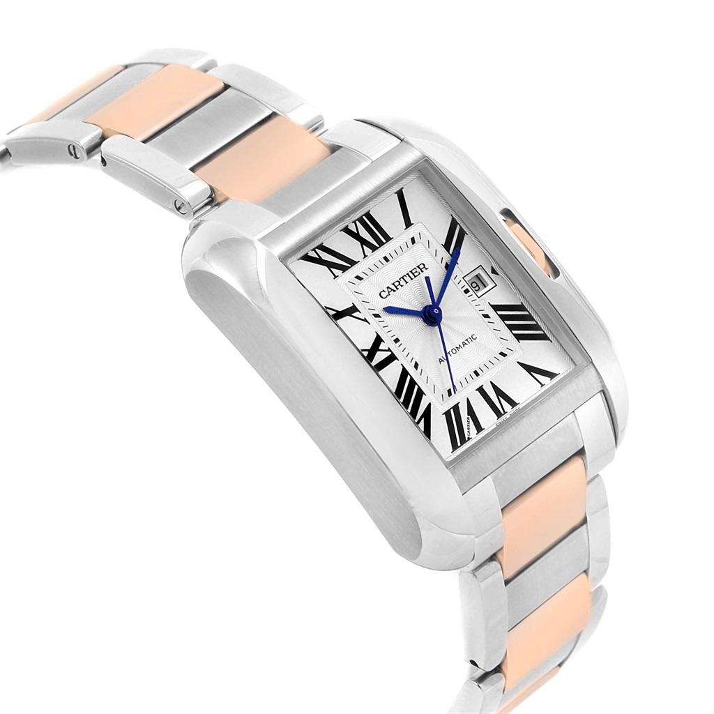 Cartier Tank Anglaise Large Steel Rose Gold Watch W5310007. Automatic self-winding movement. Stainless steel and 18K rose gold rectangle case 39.2 mm x 29.8 mm. Case thickness: 9.5 mm. Crown set with the faceted blue spinel. Fixed stainless steel