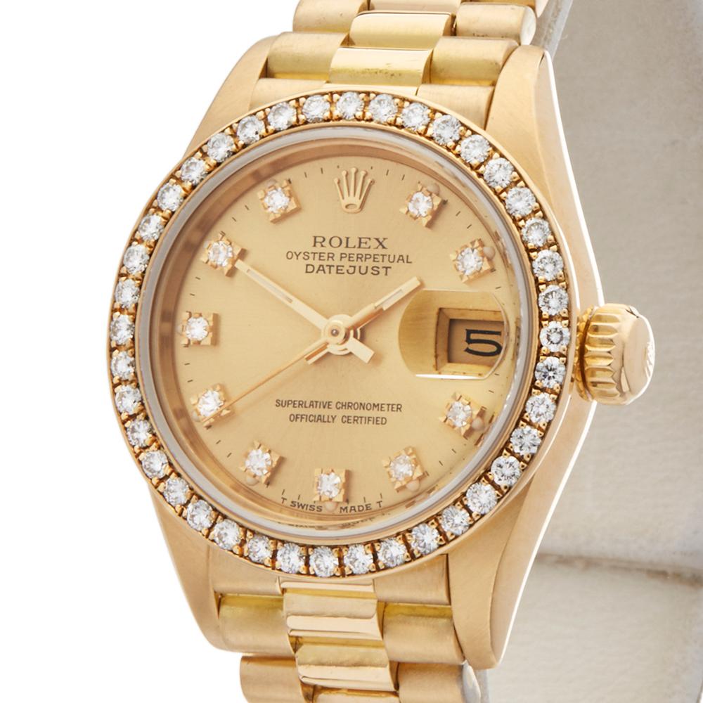 Contemporary 1989 Rolex Datejust Yellow Gold 69138 Wristwatch
 *
 *Complete with: Box Only dated 1989
 *Case Size: 26mm
 *Strap: 18K Yellow Gold President
 *Age: 1989
 *Strap length: Adjustable up to 15cm. Please note we can order spare links and