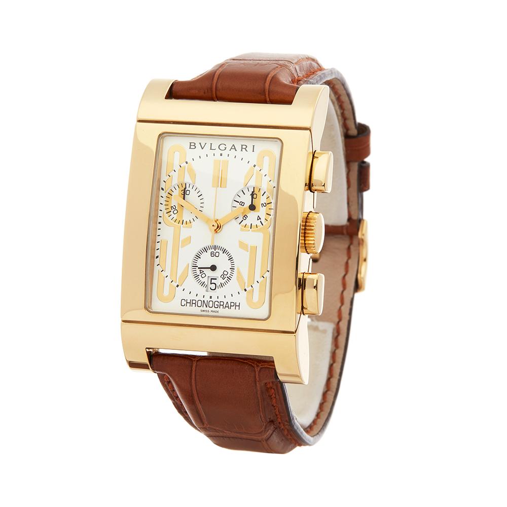 Contemporary 2010's Bulgari Rettangolo Chronograph Yellow Gold RTC 49G Wristwatch
 *
 *Complete with: Xupes Presentation Box dated 2010's
 *Case Size: 29mm by 48mm
 *Strap: Brown Leather
 *Age: 2010's
 *Strap length: Adjustable up to 18cm. Please