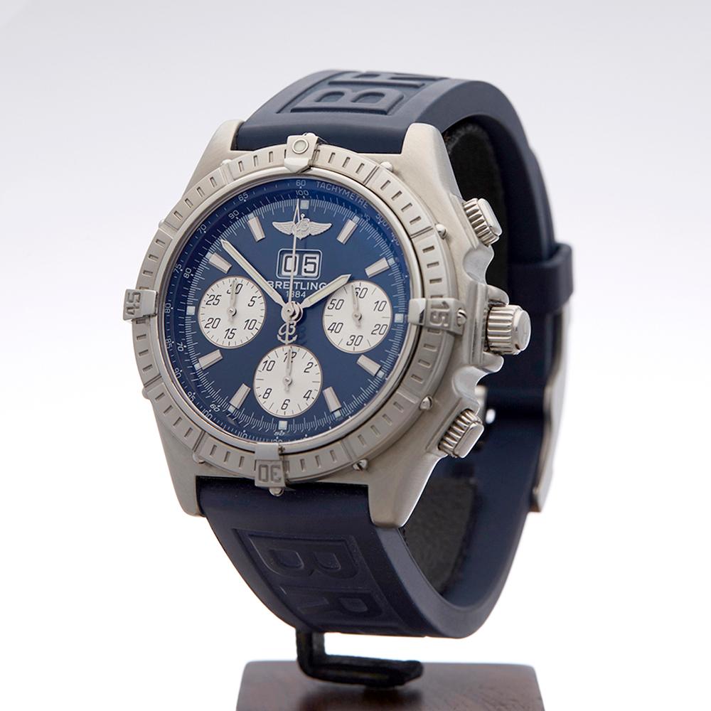 Contemporary 2004 Breitling Crosswind Big Date Chronograph Stainless Steel Wristwatch
 *
 *Complete with: Box, Manuals & Guarantee dated 5th September 2004
 *Case Size: 44mm
 *Strap: Blue Rubber
 *Age: 2004
 *Strap length: Adjustable up to 20cm.