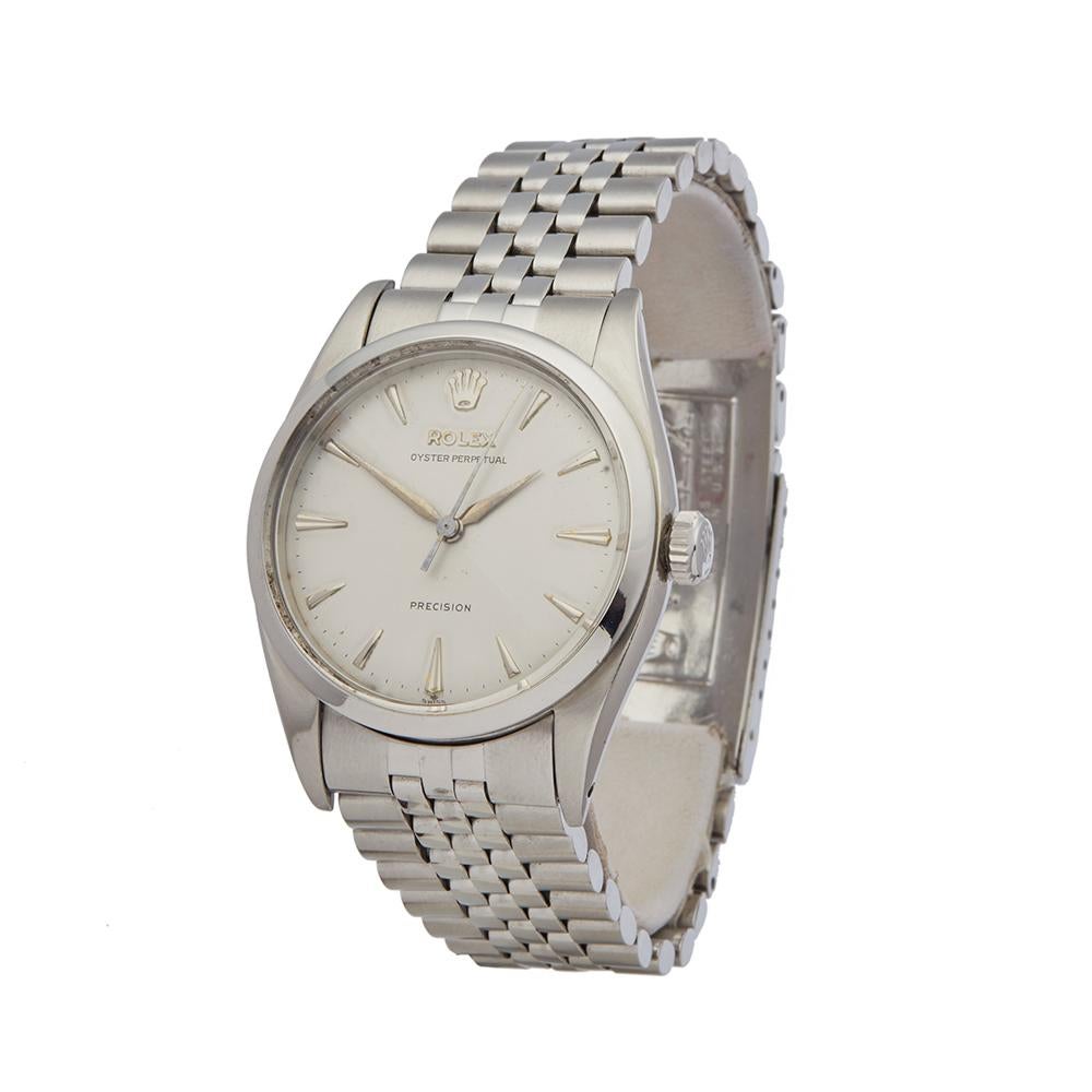 Vintage
 *
 *Complete with: Presentation Box & Service Papers dated 1953
 *Case Size: 36mm
 *Strap: Stainless Steel
 *Age: 1953
 *Strap length: Adjustable up to 18cm. Please note we can order spare links and alternate length/colour straps if
