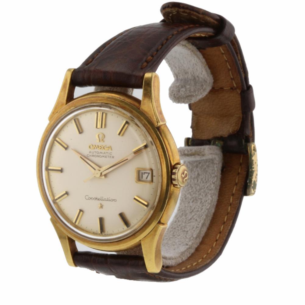 Omega Constellation Reference #:Constellation. Vintage Omega Constellation 18K Yellow Gold Automatic 34mm Men Watch Box/Papers. Verified and Certified by WatchFacts. 1 year warranty offered by WatchFacts.
