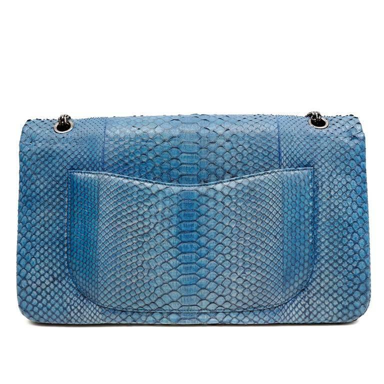 Chanel Grey Blue Python Maxi Double Flap- PRISTINE The stunning exotic skin is highlighted perfectly with ruthenium hardware. This is a must have piece for any collection. Glorious blue python has grey striations and outlines each scale exquisitely.