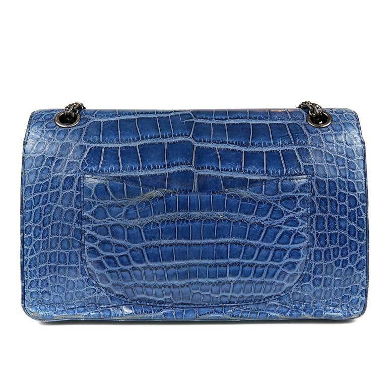 Chanel Blue Sapphire Crocodile 2.55- MINT Extremely rare in the exotic versions, this strikingly beautiful piece is a must have for any collector. Vibrant blue sapphire crocodile skin double flap is paired with edgy ruthenium hardware. Mademoiselle