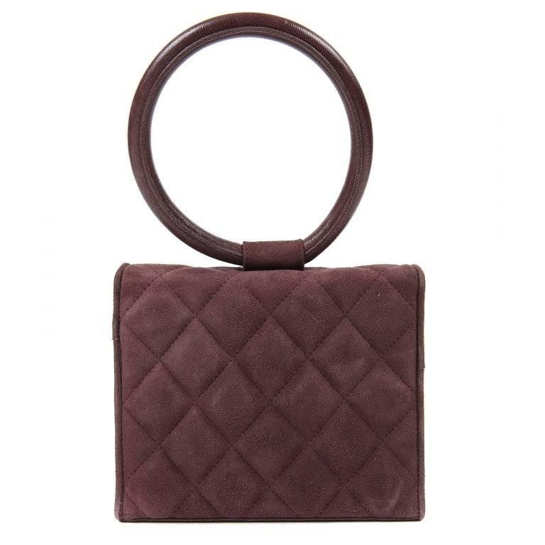 Chanel Wine Suede Gripoix Jewels Evening Bag- MINT A very rare piece featuring an iconic Chanel Gripoix flower design that is a must have for any collector. Deep wine suede is quilted in signature Chanel diamond pattern. Front flap is adorned with a
