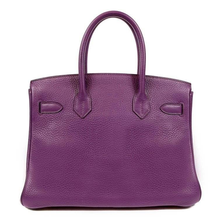 This authentic Hermes Ultra Violet Togo 30 cm Birkin is in excellent condition. 
Hand stitched by skilled craftsmen, wait lists of a year or more are not uncommon for the Hermes Birkin. They are considered the ultimate in luxury fashion. Ultra