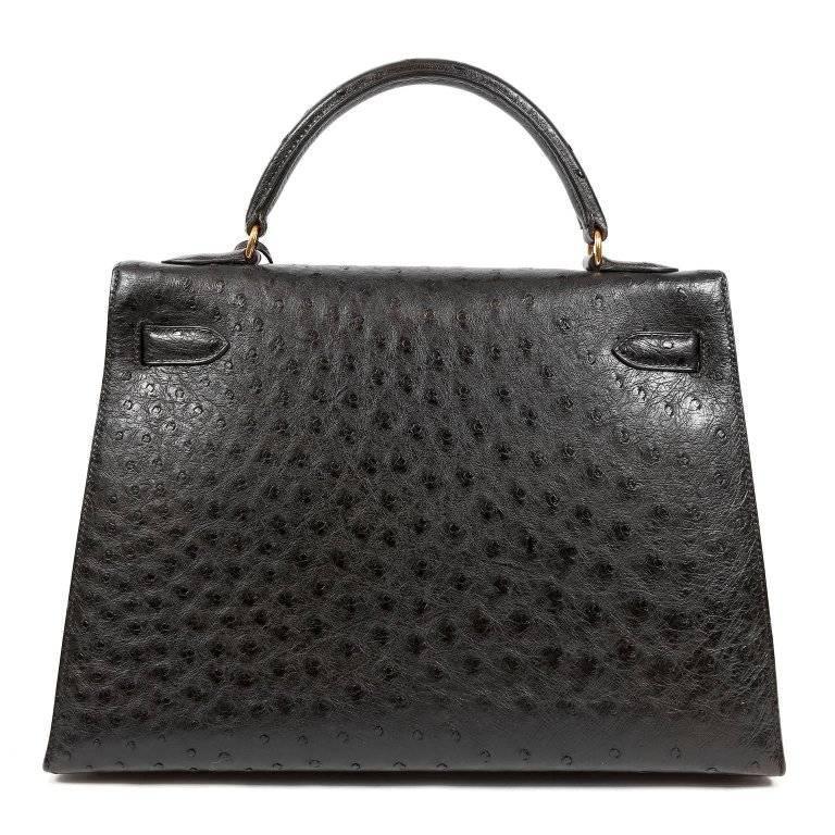 Hermes Black Ostrich 32 cm Kelly- MINT Condition Hermes bags are considered the ultimate luxury item the world over. Hand stitched by skilled craftsmen, wait lists of a year or more are commonplace for the bovine versions. The exotics are very rare