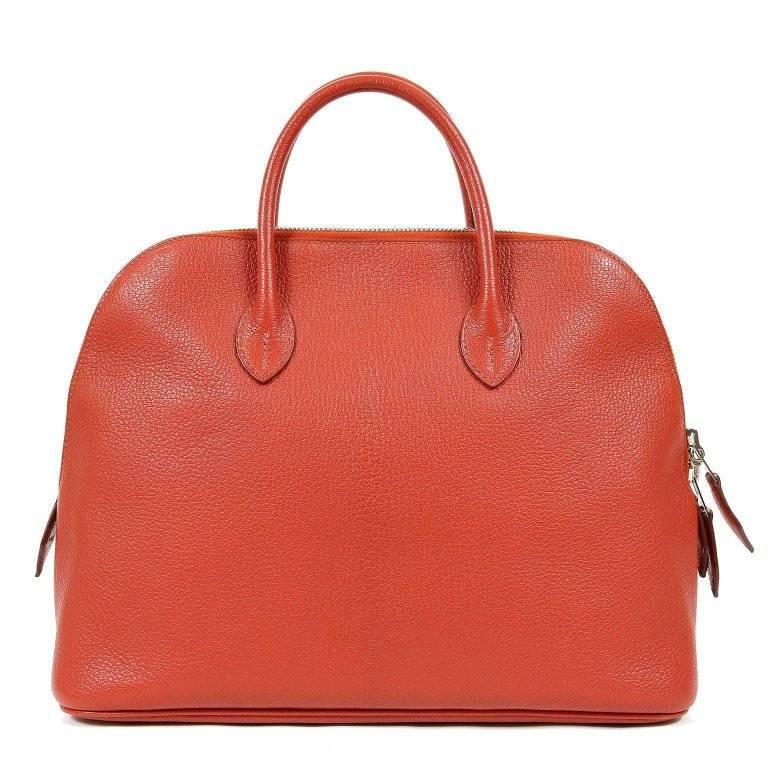 This authentic Hermes Coq de Roche Chevre Web Bolide 1923 Bag is in pristine condition. The rounded top satchel is perfectly scaled and beautifully understated; a must have for any comprehensive wardrobe. Hermes bags are hand stitched by skilled