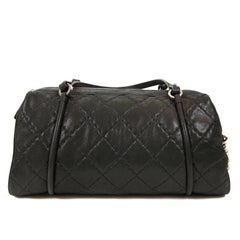 Boléro Chanel en cuir d'agneau émaillé noir