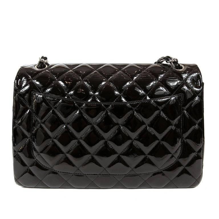 Chanel Black Patent Leather Jumbo Classic- Better than Excellent Condition The classic silhouette makes this coveted Chanel perfect for any occasion and a must have in any wardrobe. Black durable patent leather is quilted in signature Chanel diamond