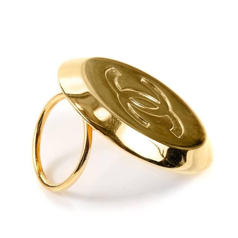 Chanel Gold CC Scarf Clip- Excellent Vintage Condition. 
A must have for the collector, it elevates the scarf to a whole new level. Circular gold scarf ring with raised interlocking CC. Hinged loop back. 
A484