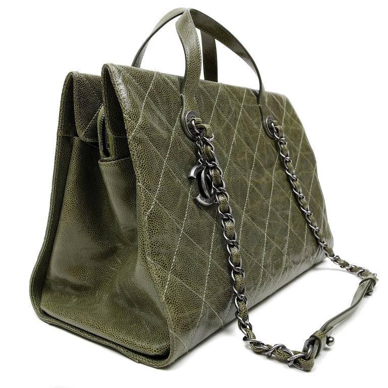 Chanel Olive Caviar Crave Tote- PRISTINE Very sophisticated, this structured tote can be worn for a variety of purposes. Neutral olive green caviar leather is textured and durable. Signature Chanel diamond stitched pattern with edgy ruthenium CC