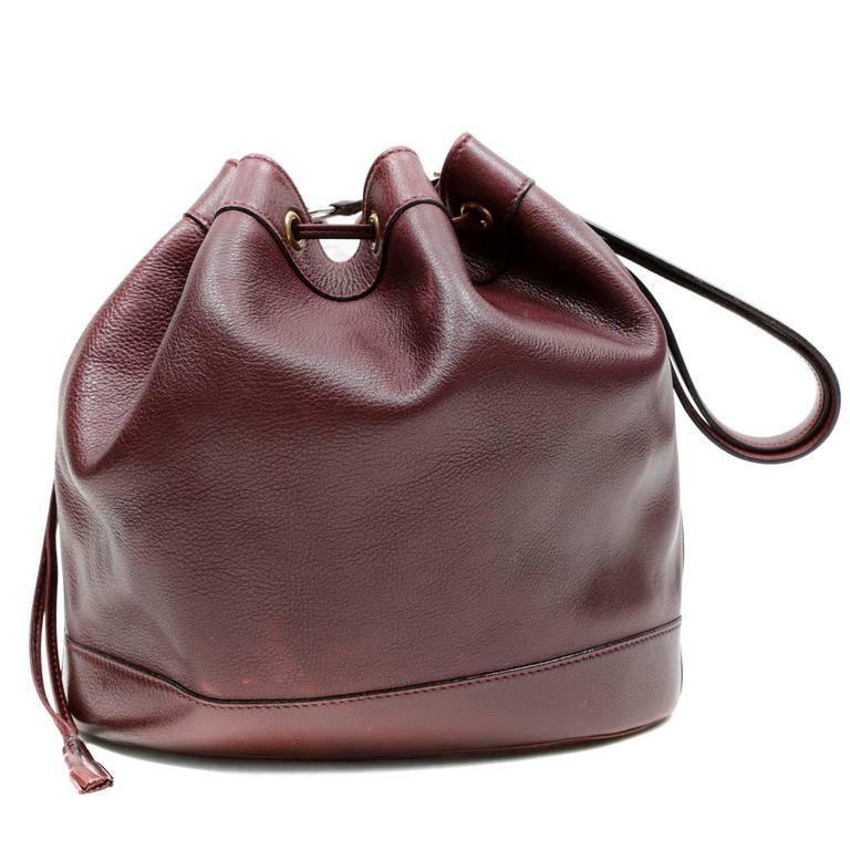 Hermes Bordeaux Leather Vintage Market Bag- EXCELLENT The classic silhouette is a drawstring bucket bag; perfect for every day enjoyment. Deep Bordeaux textured leather bucket bag holds everything easily. Leather drawstring opening, unlined interior