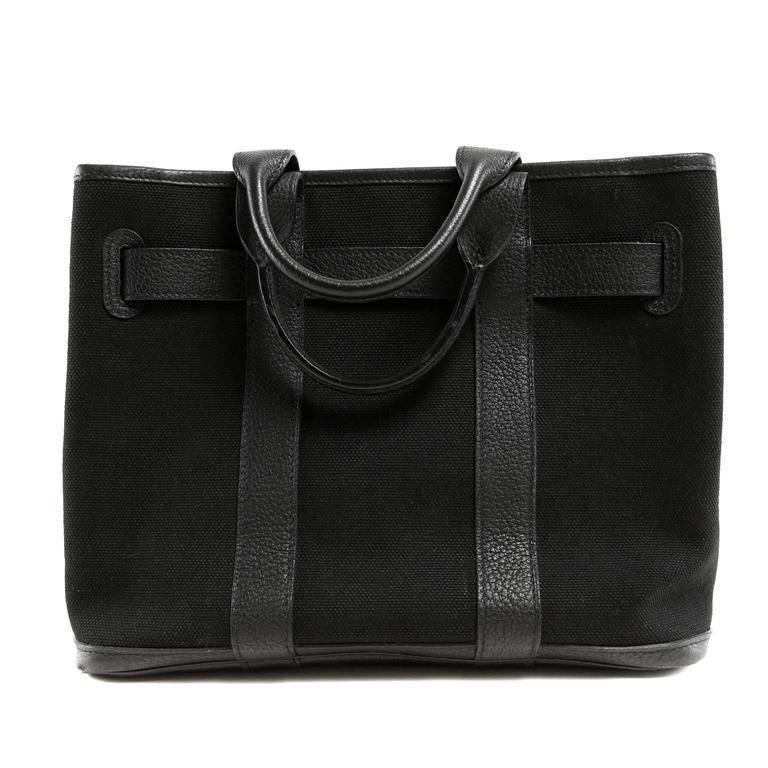 Hermes Black Petit Ceinture PM Tote- PRISTINE; appears never carried The canvas and leather bag has an ample twelve inch width and is suitable for both men and women. Black durable canvas is trimmed with coordinating Togo leather, a durable and