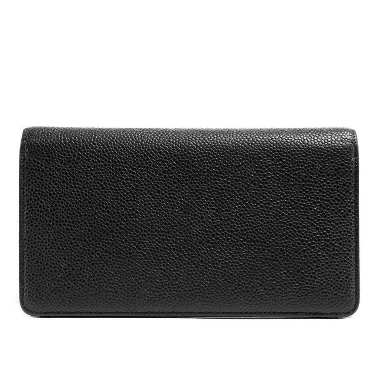 Chanel Black Caviar Leather Portfolio Wallet- PRISTINE; Never Carried Simply elegant, this roomy wallet can be carried either men or women. Black caviar leather is textured and durable; an excellent leather for an often handles accessory. Large