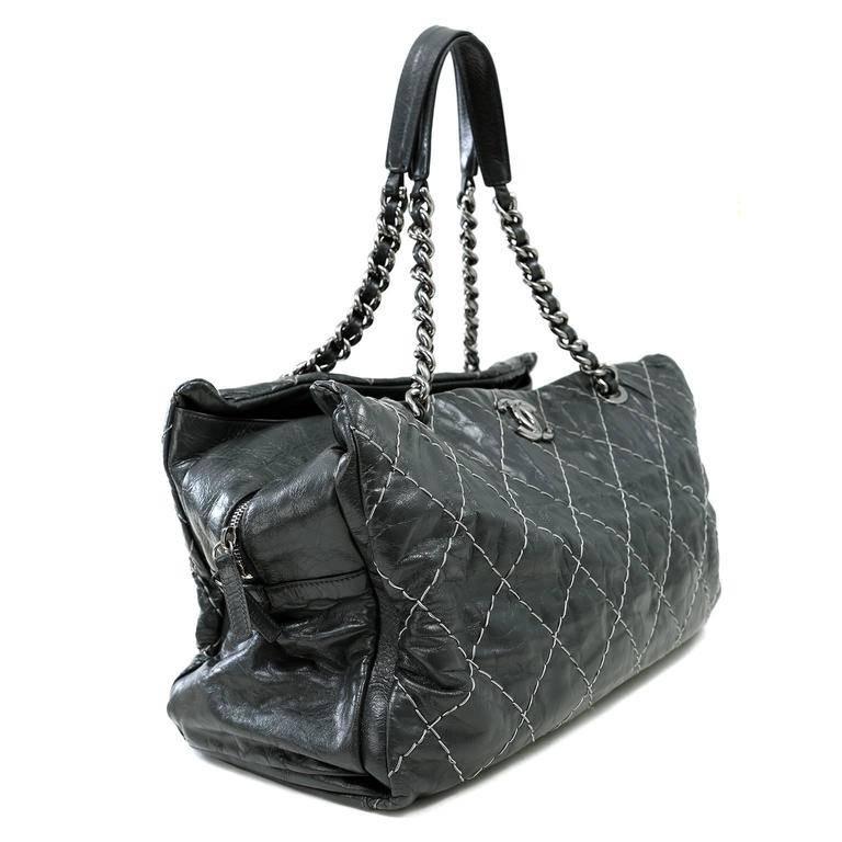 Chanel Grey Contrast Stitched Leather XXL Day Bag- Pristine Versatile and chic, this very roomy tote is ready for anything. Dark grey distressed leather is top stitched in signature Chanel diamond pattern with contrasting thread. A central zippered