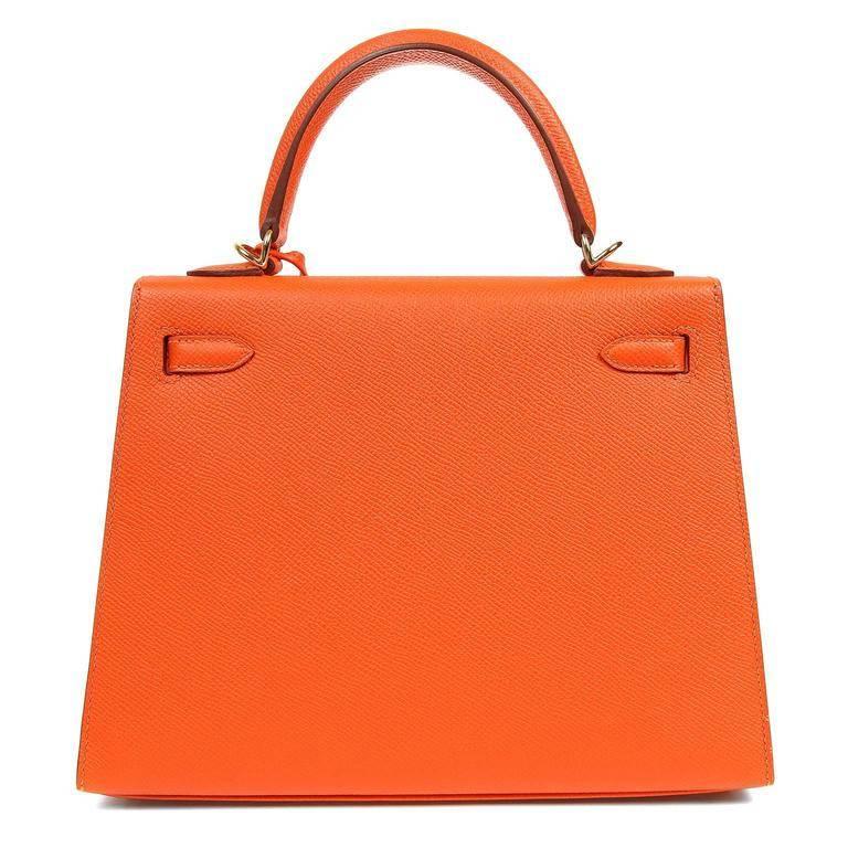 Hermes Feu Epsom 25 cm Kelly Sellier- PRISTINE, unworn condition. Store fresh, the protective plastic is intact on the hardware. Hermes bags are considered the ultimate luxury item worldwide. Each piece is handcrafted with waitlists that can exceed