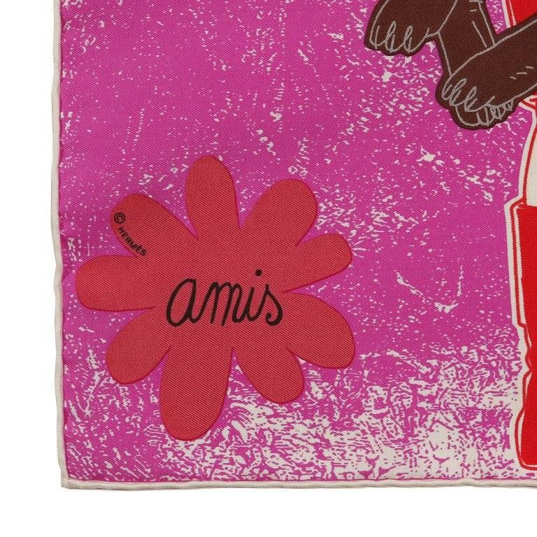 This authentic Hermes Fuchsia Amis Pour La Vie Pochette Scarf is pristine with the box. Issued in 2010 and designed by Agathe Gonnet. Forest background in fuchsia features a young woman lovingly holding a large wolf or dog in her arms. Friends for