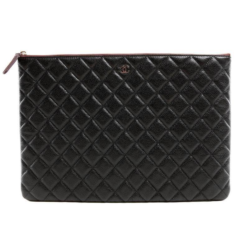 Sold at Auction: Chanel - Large Caviar O Case Clutch Black Quilted Leather  Zip Bag Pouch Gold CC